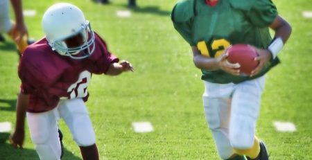 Children playing youth football