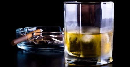 Image of a cigar and alcoholic beverage 